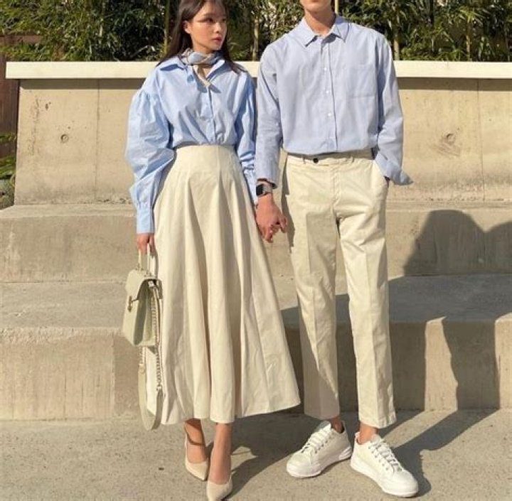 Cute couple coordinating outfits at baseball game
